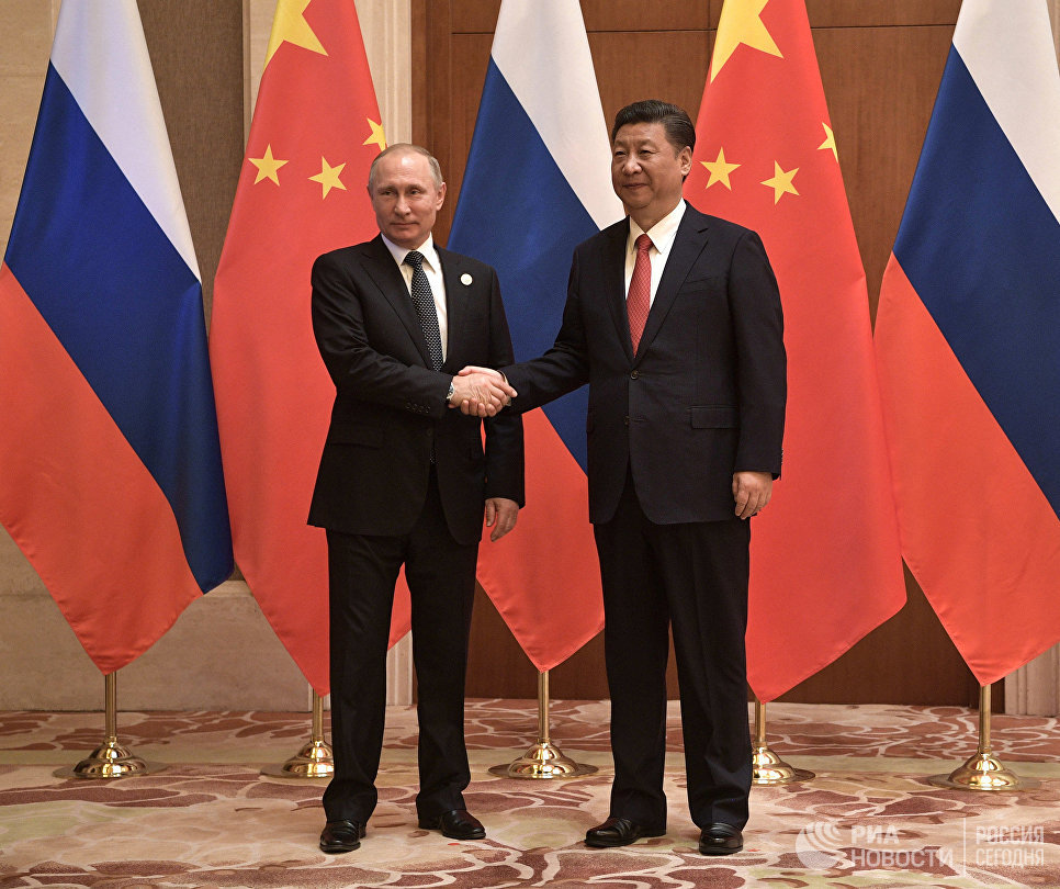 Президент РФ Владимир Путин и председатель КНР Си Цзиньпин во время российско-китайских переговоров в рамках Международного форума Один пояс, один путь. 14 мая 2017