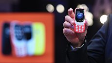 Обновленная версия классической модели мобильного телефона Nokia 3310 во время российской презентации в Москве. 16 мая 2017 Обновленная версия классической модели мобильного телефона Nokia 3310 во время российской презентации в Москве. 16 мая 2017