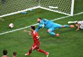 Федор Смолов забивает мяч в матче Кубка конфедераций-2017 по футболу между сборными России и Новой Зеландии в Санкт-Петербурге. 17 июня 2017 Федор Смолов забивает мяч в матче Кубка конфедераций-2017 по футболу между сборными России и Новой Зеландии в Санкт-Петербурге. 17 июня 2017