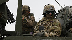 Военнослужащие армии США во время учений в Литве Военнослужащие армии США во время учений в Литве