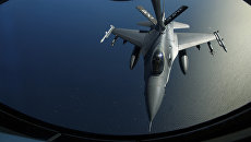 Истребитель НАТО F-16. Архивное фото Истребитель НАТО F-16. Архивное фото