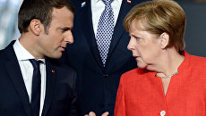 Президент Франции Эммануэль Макрон и федеральный канцлер ФРГ Ангела Меркель. Архивное фото Президент Франции Эммануэль Макрон и федеральный канцлер ФРГ Ангела Меркель. Архивное фото