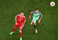 Дмитрий Комбаров (Россия) и Седрик Соареш (Португалия) во время матча Кубка конфедераций-2017 по футболу между сборными России и Португалии Дмитрий Комбаров (Россия) и Седрик Соареш (Португалия) во время матча Кубка конфедераций-2017 по футболу между сборными России и Португалии