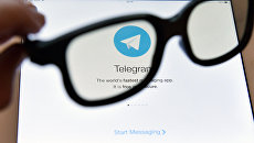 Логотип мессенджера Telegram. Архивное фото Логотип мессенджера Telegram. Архивное фото
