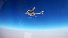 Стратегический ракетоносец Ту-95МС во время нанесения удара по объектам ИГ* (группировка Исламское государство, запрещена в РФ) на границе провинций Хама и Хомс в Сирии. 5 июля 2017 Стратегический ракетоносец Ту-95МС во время нанесения удара по объектам ИГ* (группировка Исламское государство, запрещена в РФ) на границе провинций Хама и Хомс в Сирии. 5 июля 2017