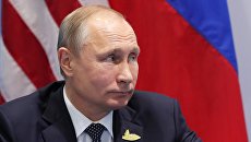 Президент РФ Владимир Путин во время встречи с президентом США Дональдом Трампом. Архивное фото Президент РФ Владимир Путин во время встречи с президентом США Дональдом Трампом. Архивное фото
