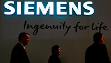 Логотип промышленного концерна Siemens. Архивное фото Логотип промышленного концерна Siemens. Архивное фото