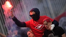 Болельщики Спартака во время матча. Архивное фото Болельщики Спартака во время матча. Архивное фото