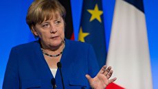 Ангела Меркель во время совместной пресс-конференции c президентом Франции Эммануэлем Макронм. 13 июля 2017 Ангела Меркель во время совместной пресс-конференции c президентом Франции Эммануэлем Макронм. 13 июля 2017