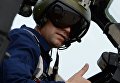 Командир в кабине вертолета Ми-28 во время учений отдельного вертолетного полка на аэродроме Черниговка в Приморском крае Командир в кабине вертолета Ми-28 во время учений отдельного вертолетного полка на аэродроме Черниговка в Приморском крае