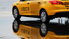 Такси Uber. Архивное фото Такси Uber. Архивное фото