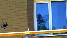 Последствия обстрела в Донецке. Архивное фото Последствия обстрела в Донецке. Архивное фото