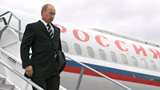 Владимир Путин на борту номер один. Архивное фото Владимир Путин на борту номер один. Архивное фото