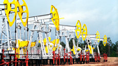 Нефтекачалки в городе Когалым. Архивное фото Нефтекачалки в городе Когалым. Архивное фото