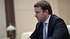 Министр экономического развития РФ Максим Орешкин во время встречи с президентом РФ Владимиром Путиным. 23 сентября 2017 Министр экономического развития РФ Максим Орешкин во время встречи с президентом РФ Владимиром Путиным. 23 сентября 2017