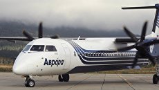 Самолет Bombardier Q400 авиакомпании Аврора в аэропорту Менделеево на острове Кунашир. 24 сентября 2017 Самолет Bombardier Q400 авиакомпании Аврора в аэропорту Менделеево на острове Кунашир. 24 сентября 2017