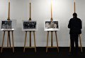 Посетитель на фотовыставке МИА Россия сегодня в рамках премьеры фильма Салют-7 в кинотеатре Октябрь Посетитель на фотовыставке МИА Россия сегодня в рамках премьеры фильма Салют-7 в кинотеатре Октябрь