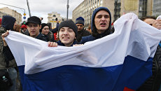 Участники несанкционированной акции на Пушкинской площади в Москве. 7 октября 2017 Участники несанкционированной акции на Пушкинской площади в Москве. 7 октября 2017