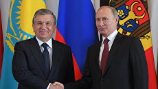 Президент РФ Владимир Путин и президент Узбекистана Шавкат Мирзиеев. Архивное фото Президент РФ Владимир Путин и президент Узбекистана Шавкат Мирзиеев. Архивное фото