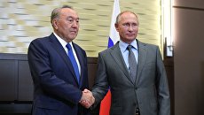 Владимир Путин и президент Казахстана Нурсултан Назарбаев. Архивное фото Владимир Путин и президент Казахстана Нурсултан Назарбаев. Архивное фото