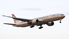 Самолет Боинг 777 авиакомпании Etihad Airways. Архивное фото Самолет Боинг 777 авиакомпании Etihad Airways. Архивное фото
