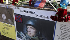 Портрет погибшего командира ополчения ДНР Арсена Павлова (Моторола). Архивное фото Портрет погибшего командира ополчения ДНР Арсена Павлова (Моторола). Архивное фото