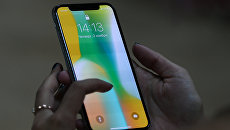 Cмартфон iPhone X от компании Apple. Архивное фото Cмартфон iPhone X от компании Apple. Архивное фото