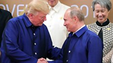 Владимир Путин и Дональд Трамп. Архивное фото Владимир Путин и Дональд Трамп. Архивное фото