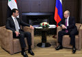 Президент РФ Владимир Путин и президент Сирии Башар Асад во время встречи Президент РФ Владимир Путин и президент Сирии Башар Асад во время встречи