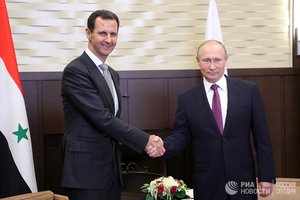Президент РФ Владимир Путин и президент Сирии Башар Асад во время встречи Президент РФ Владимир Путин и президент Сирии Башар Асад во время встречи