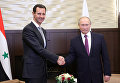 Президент РФ Владимир Путин и президент Сирии Башар Асад во время встречи Президент РФ Владимир Путин и президент Сирии Башар Асад во время встречи