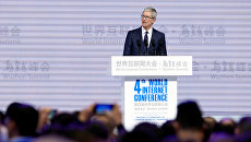 Генеральный директор Apple Тим Кук на церемонии открытия четвертой Всемирной интернет-конференции в Китае. 3 декабря 2017 Генеральный директор Apple Тим Кук на церемонии открытия четвертой Всемирной интернет-конференции в Китае. 3 декабря 2017
