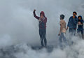 Палестинцы во время акции протеста против решения Дональда Трампа признать Иерусалим столицей Израиля в городе Газа. 7 декабря 2017 Палестинцы во время акции протеста против решения Дональда Трампа признать Иерусалим столицей Израиля в городе Газа. 7 декабря 2017