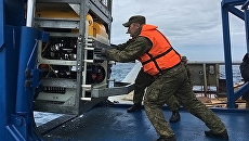 Специалисты ВМФ России принимают участие в поисках подводной лодки Сан-Хуан ВМС Аргентины. Архивное фото Специалисты ВМФ России принимают участие в поисках подводной лодки Сан-Хуан ВМС Аргентины. Архивное фото