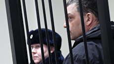 Экс-директор фабрики Меньшевик Илья Аверьянов, обвиняемый в убийстве. Архивное фото Экс-директор фабрики Меньшевик Илья Аверьянов, обвиняемый в убийстве. Архивное фото