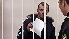 Дмитрий Лукьяненко, обвиняемый в организации взрыва в магазине Перекресток на Кондратьевском проспекте, на заседании Калининского суда Санкт-Петербурга. 31 декабря 2017 Дмитрий Лукьяненко, обвиняемый в организации взрыва в магазине Перекресток на Кондратьевском проспекте, на заседании Калининского суда Санкт-Петербурга. 31 декабря 2017
