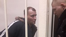Дмитрий Лукьяненко, обвиняемый в организации взрыва в магазине Перекресток на Кондратьевском проспекте, на заседании Калининского суда Санкт-Петербурга. 31 декабря 2017 Дмитрий Лукьяненко, обвиняемый в организации взрыва в магазине Перекресток на Кондратьевском проспекте, на заседании Калининского суда Санкт-Петербурга. 31 декабря 2017