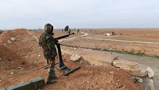 Сирийский военнослужащий в Идлибе. Архивное фото Сирийский военнослужащий в Идлибе. Архивное фото