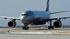 Самолет Airbus A330 авиакомпании Аэрофлот в аэропорту Владивостока Самолет Airbus A330 авиакомпании Аэрофлот в аэропорту Владивостока