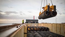 Трубы для строительства газопровода Северный поток - 2 в порту Мукран, Германия. Архивное фото Трубы для строительства газопровода Северный поток - 2 в порту Мукран, Германия. Архивное фото