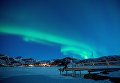 Северное сияние на Лофотенских островах, в Бостаде, Северная Норвегия Северное сияние на Лофотенских островах, в Бостаде, Северная Норвегия