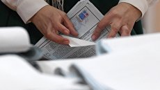 Подсчет голосов на выборах президента РФ. Архивное фото Подсчет голосов на выборах президента РФ. Архивное фото