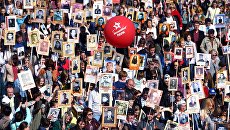 Участники акции Бессмертный полк. Архивное фото Участники акции Бессмертный полк. Архивное фото