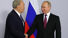Президент РФ Владимир Путин и президент Казахстана Нурсултан Назарбаев во время встречи в Сочи. 14 мая 2018 Президент РФ Владимир Путин и президент Казахстана Нурсултан Назарбаев во время встречи в Сочи. 14 мая 2018