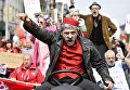 Участник акции протеста против пенсионной реформы в Брюсселе Участник акции протеста против пенсионной реформы в Брюсселе