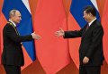 Председатель КНР Си Цзиньпин вручил президенту РФ Владимиру Путину орден Дружбы КНР. 8 июня 2018 Председатель КНР Си Цзиньпин вручил президенту РФ Владимиру Путину орден Дружбы КНР. 8 июня 2018