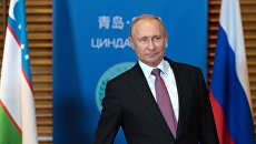 Владимир Путин и президент Республики Узбекистан Шавкат Мирзиёев во время встречи на полях саммита ШОС. 9 июня 2018 Владимир Путин и президент Республики Узбекистан Шавкат Мирзиёев во время встречи на полях саммита ШОС. 9 июня 2018