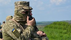 Украинские военные на линии разграничения в Донбассе. Архивное фото Украинские военные на линии разграничения в Донбассе. Архивное фото
