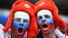 Болельщики перед матчем группового этапа чемпионата мира по футболу между сборными России и Саудовской Аравии Болельщики перед матчем группового этапа чемпионата мира по футболу между сборными России и Саудовской Аравии