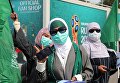 Болельщицы сборной Саудовской Аравии перед матчем группового этапа чемпионата мира по футболу между сборными России и Саудовской Аравии Болельщицы сборной Саудовской Аравии перед матчем группового этапа чемпионата мира по футболу между сборными России и Саудовской Аравии